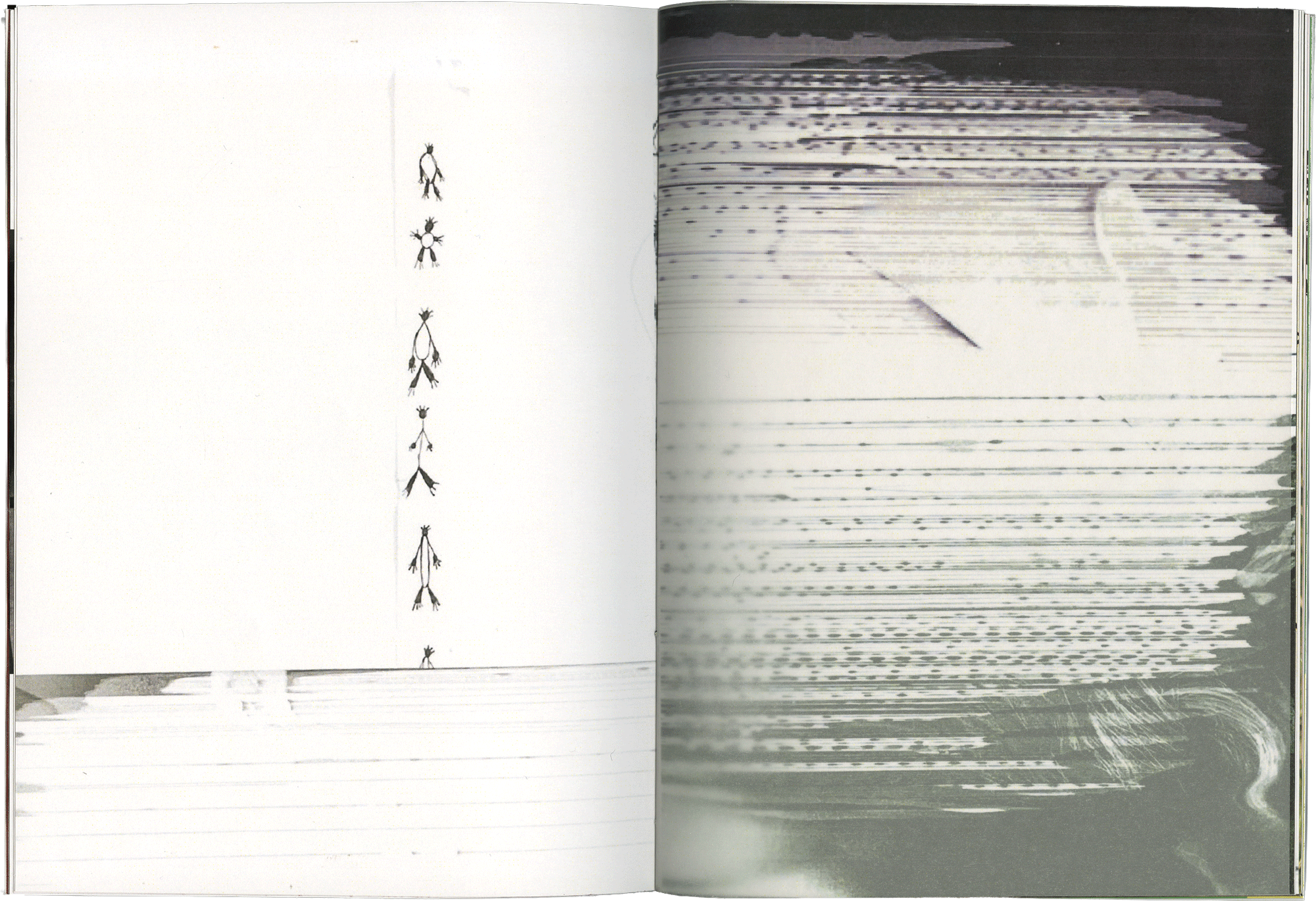 scan d'une double page noire et blanche de l'édition